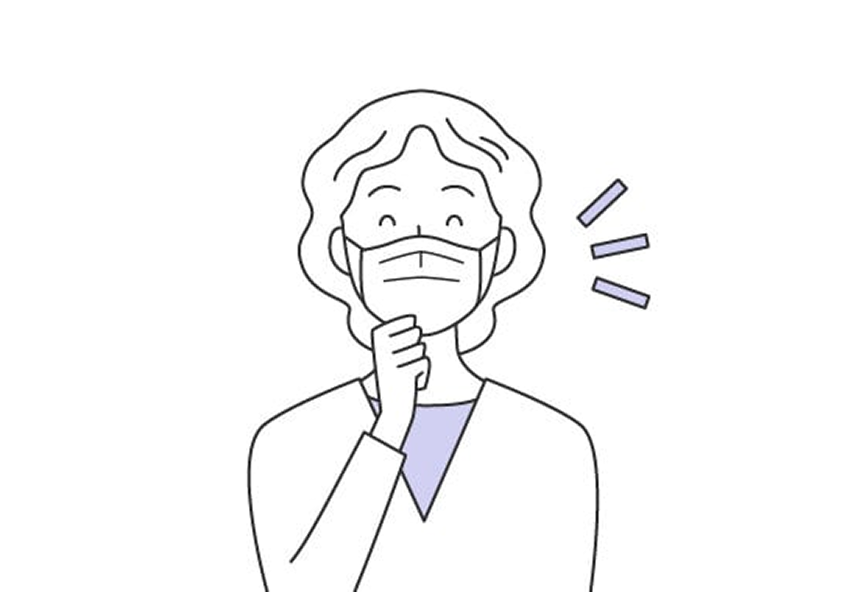 外出での感染を心配している女性